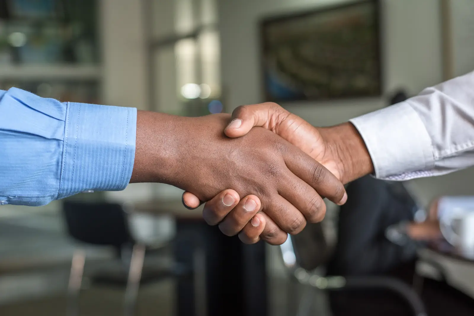 Handshake confirming a contract-to-hire conversion